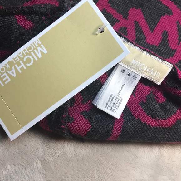 Holding.    Brand New Michael Kors Beanie - Picture 2 of 5